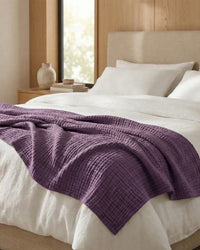 Muslin Blanket in Purple, close-up of the open cotton weave